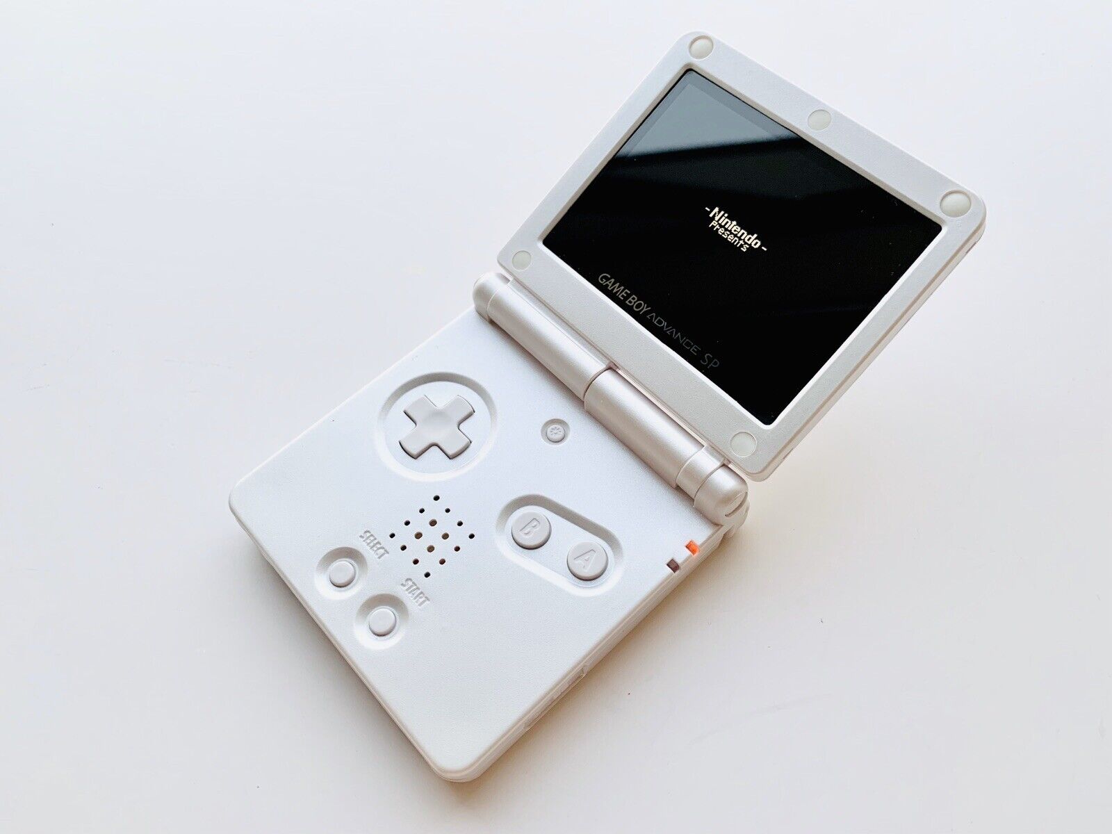Game Boy Advance SP - Pearl White - Video Game System - Used - CaveGamers - Image 2